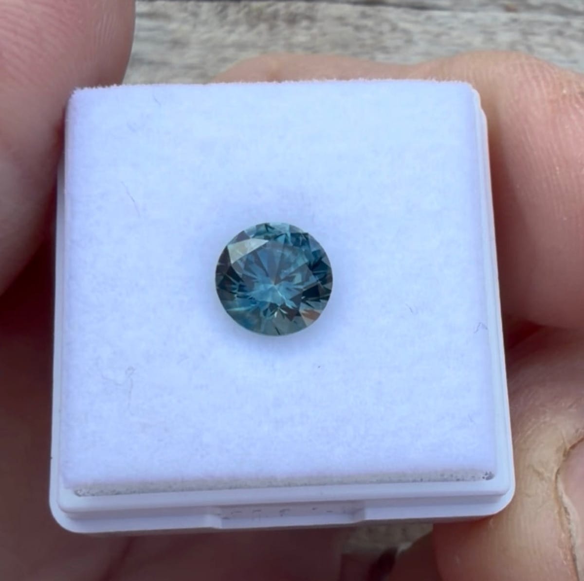 1.71ct round teal-blue Montana sapphire