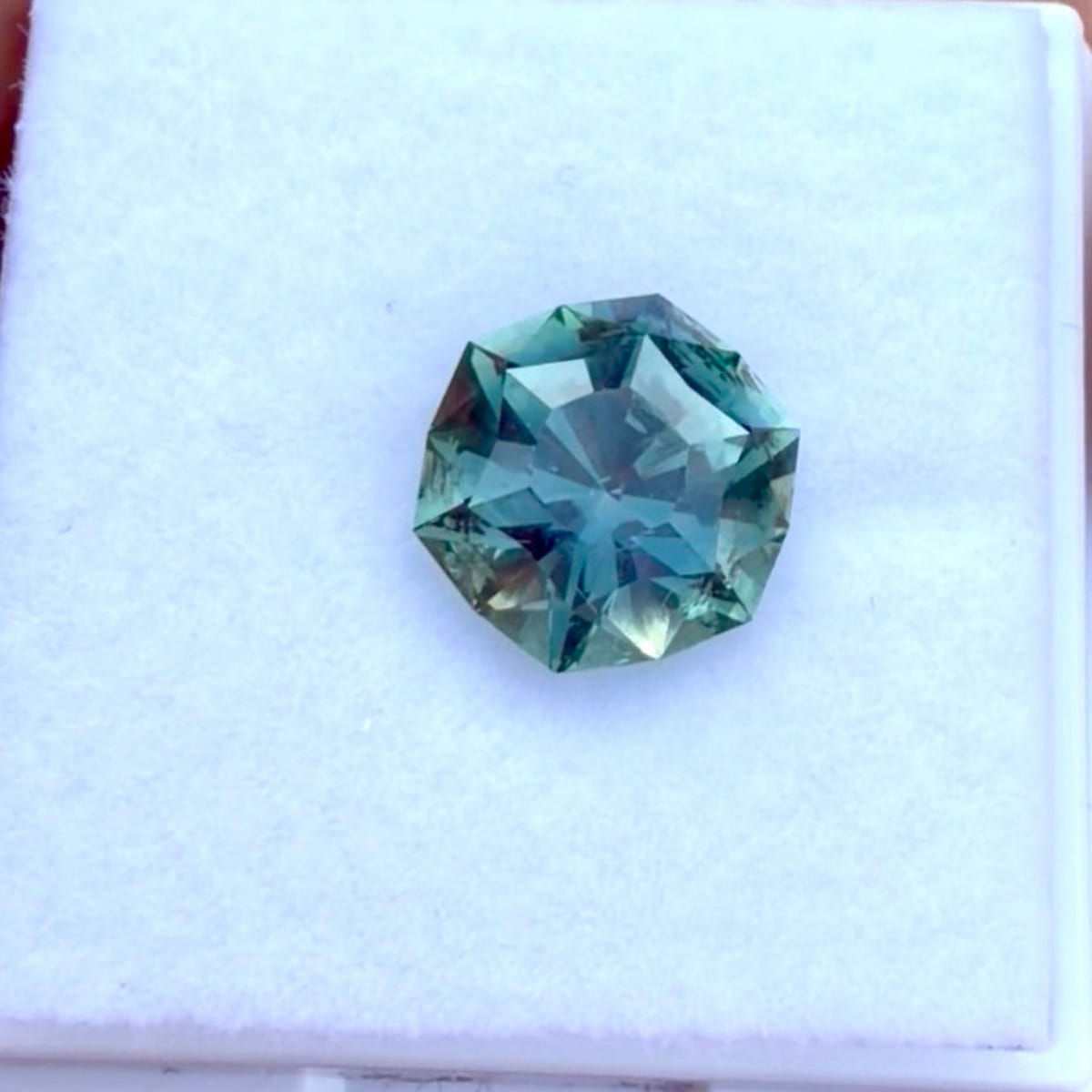 3.25ct color-changing natural Montana sapphire in hexagon cut