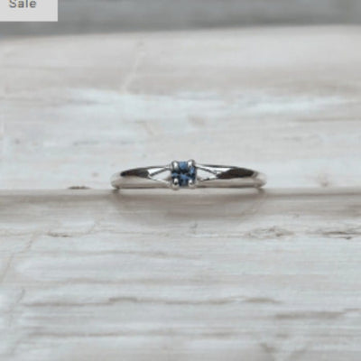 Silver ring with a small Rock Creek Sapphire