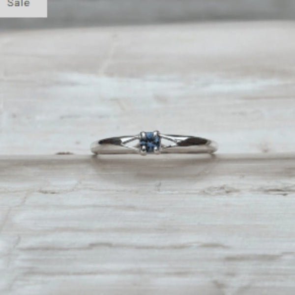 Silver ring with a small Rock Creek Sapphire
