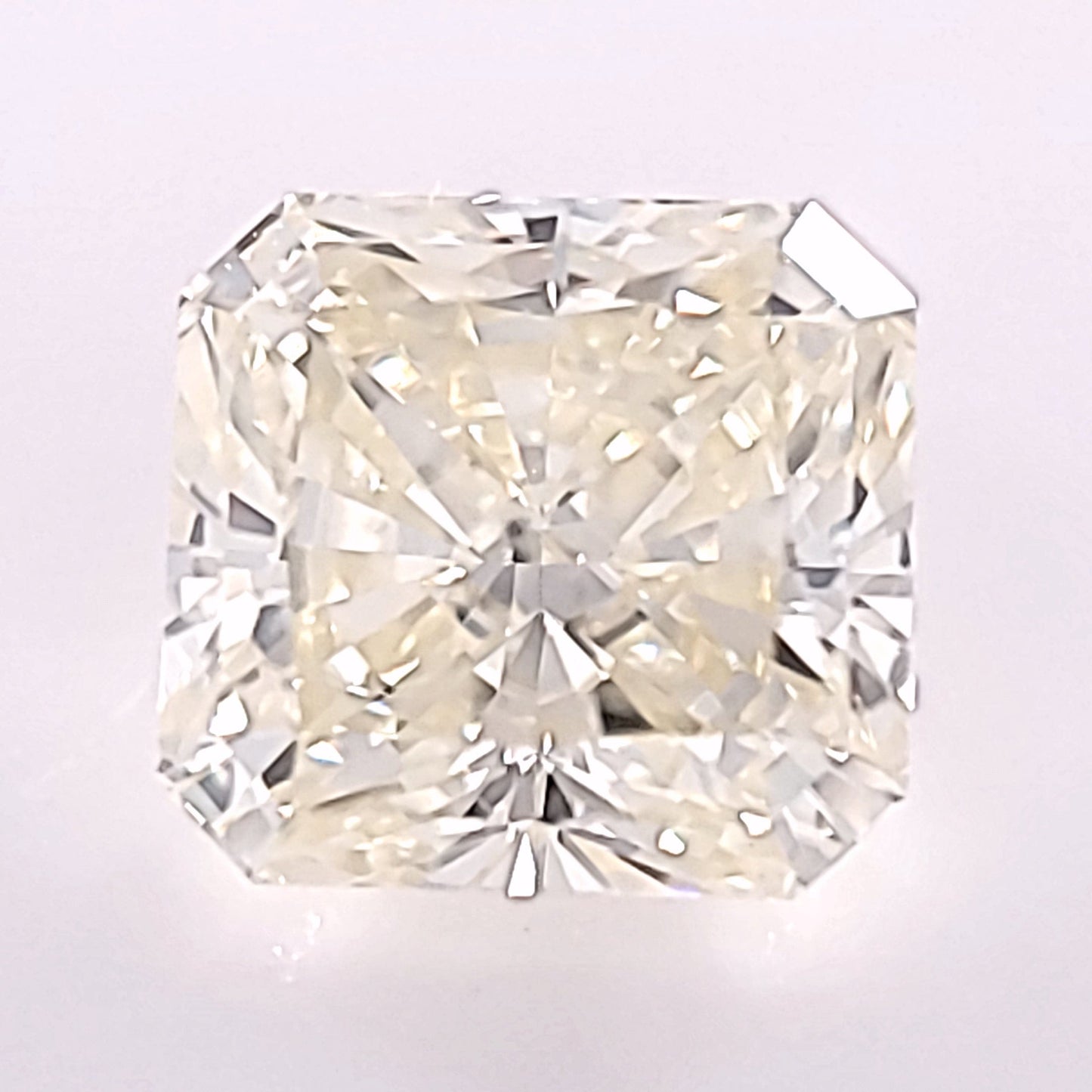 0.58ct RADIANT, FANCY LIGHT YELLOW SI1, EX EX FL Med Blue GIA #16780928