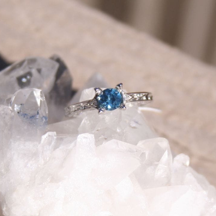 Blue Montana sapphire and diamonds set in Art Deco style ring on crystal, 