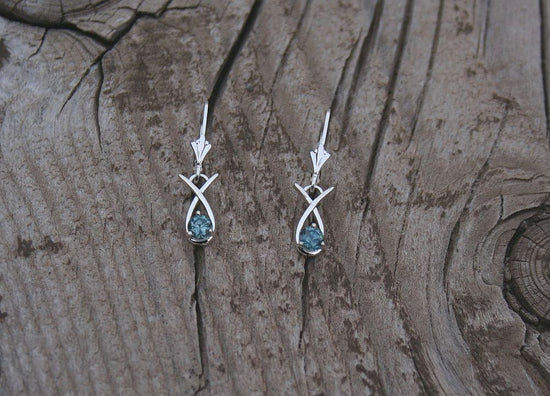 Dainty wrapped style Montana sapphire dangle earring hung on leverback earwires