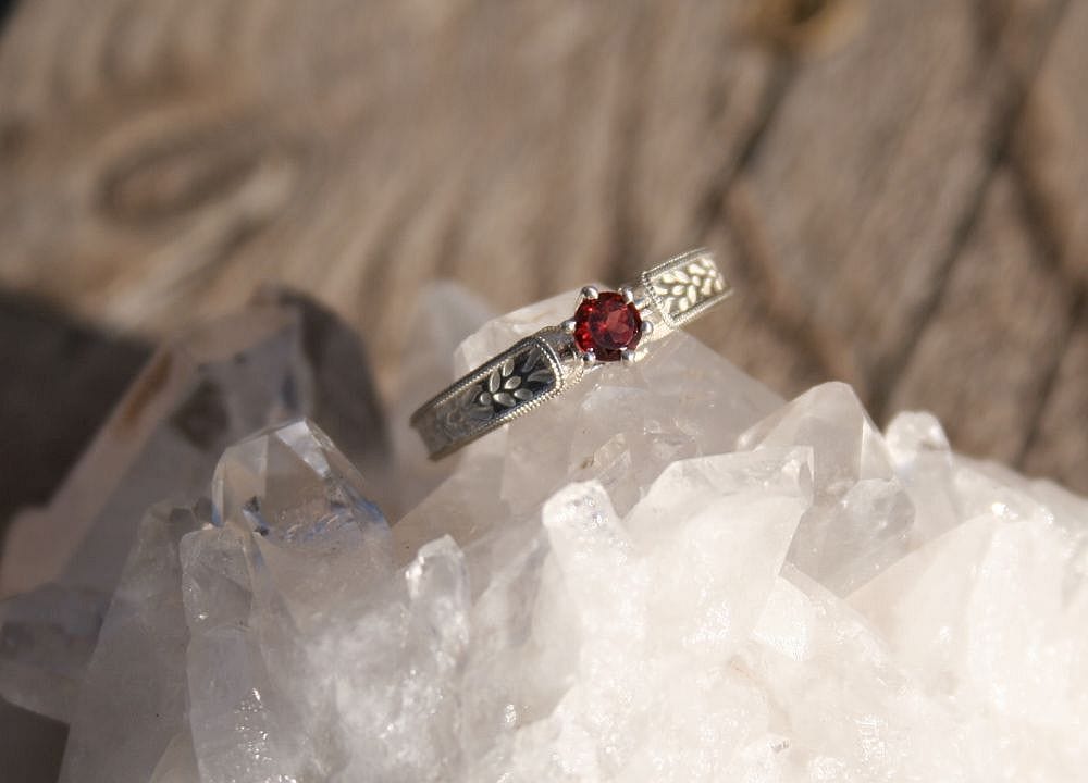 Red gemstone ring on quartz crystal - IMG_2437_1