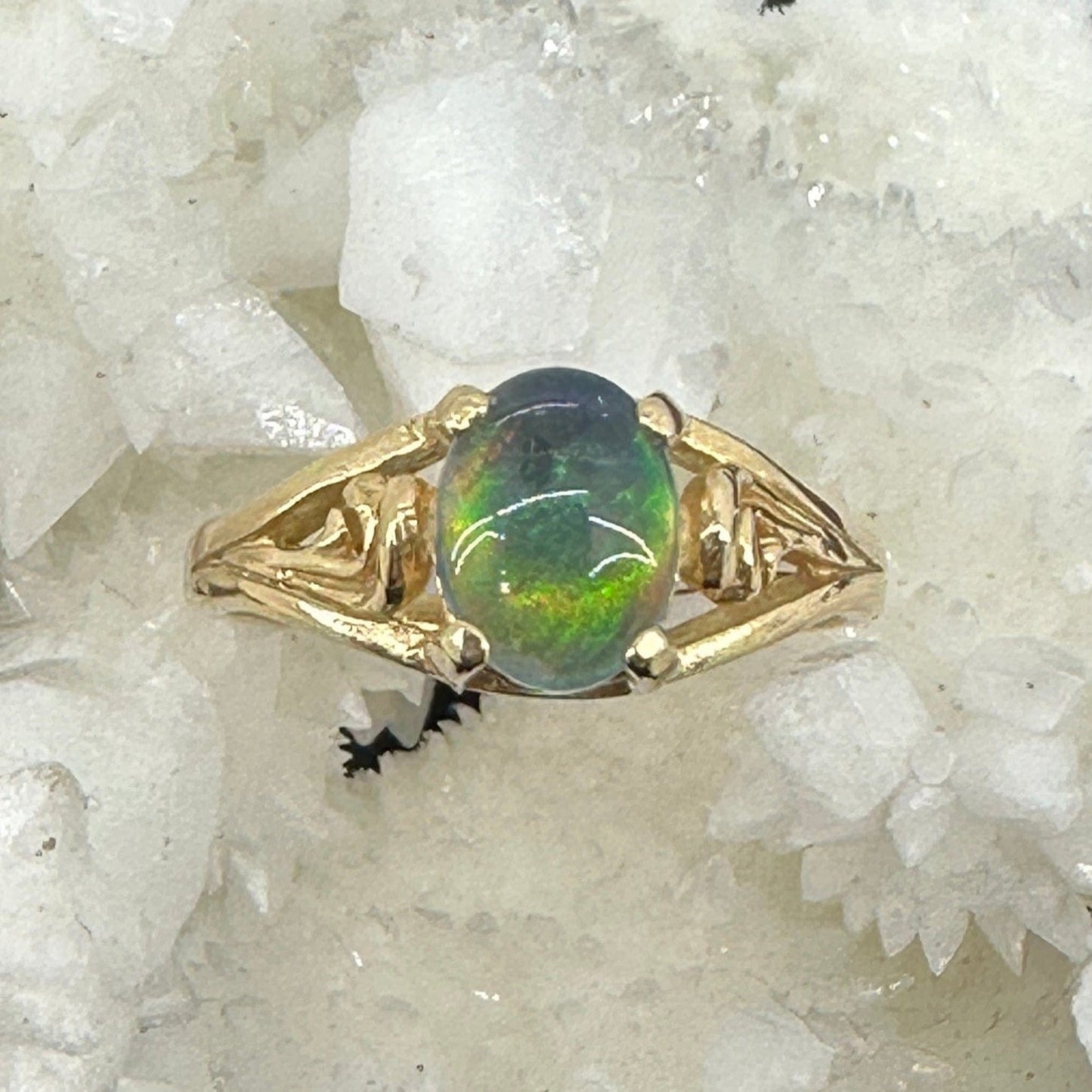 Gold Idaho opal ring with green and blue opal