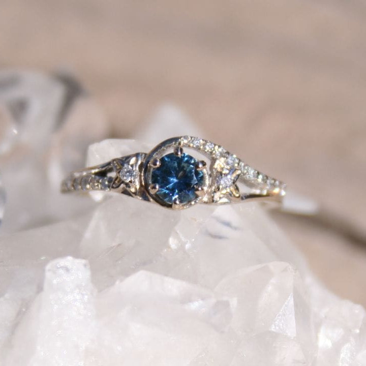 Blue sapphire engagement ring with Montana Bitterroot Flowers