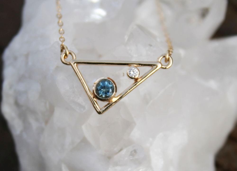 P422S_8 Gold Triangle Necklace with Blue and White Gemstones