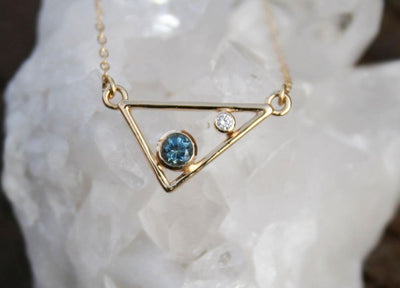P422S_8 Gold Triangle Necklace with Blue and White Gemstones
