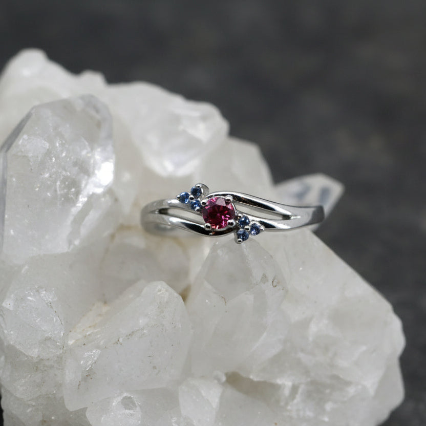 Pink and Yogo lavender sapphires split shank ring 