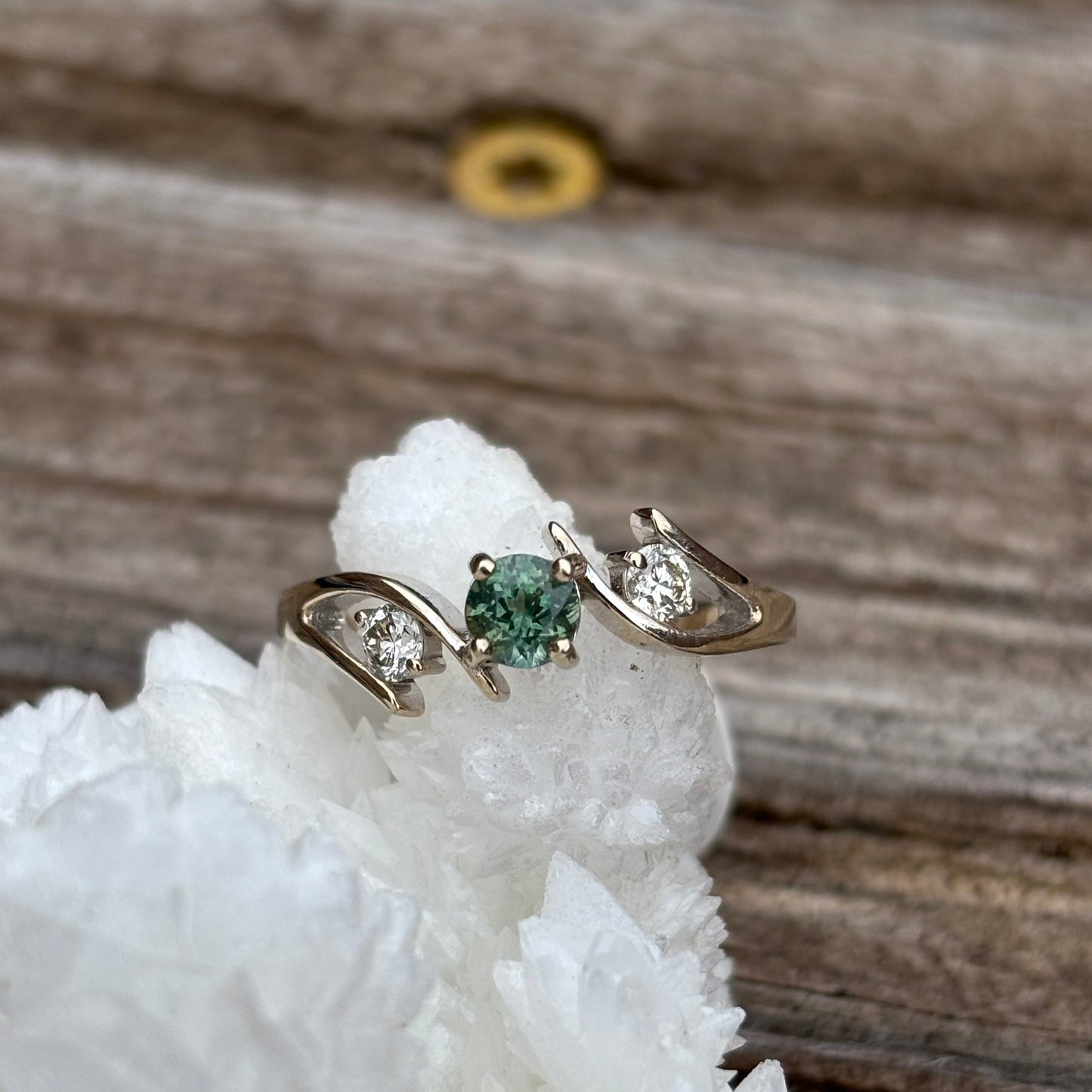 Diamonds and Green Sapphire Bypass Ring