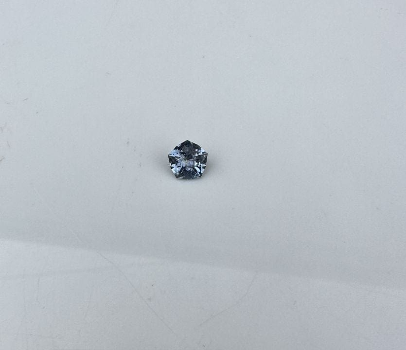 S104-6 - Star-shaped gemstone on white background