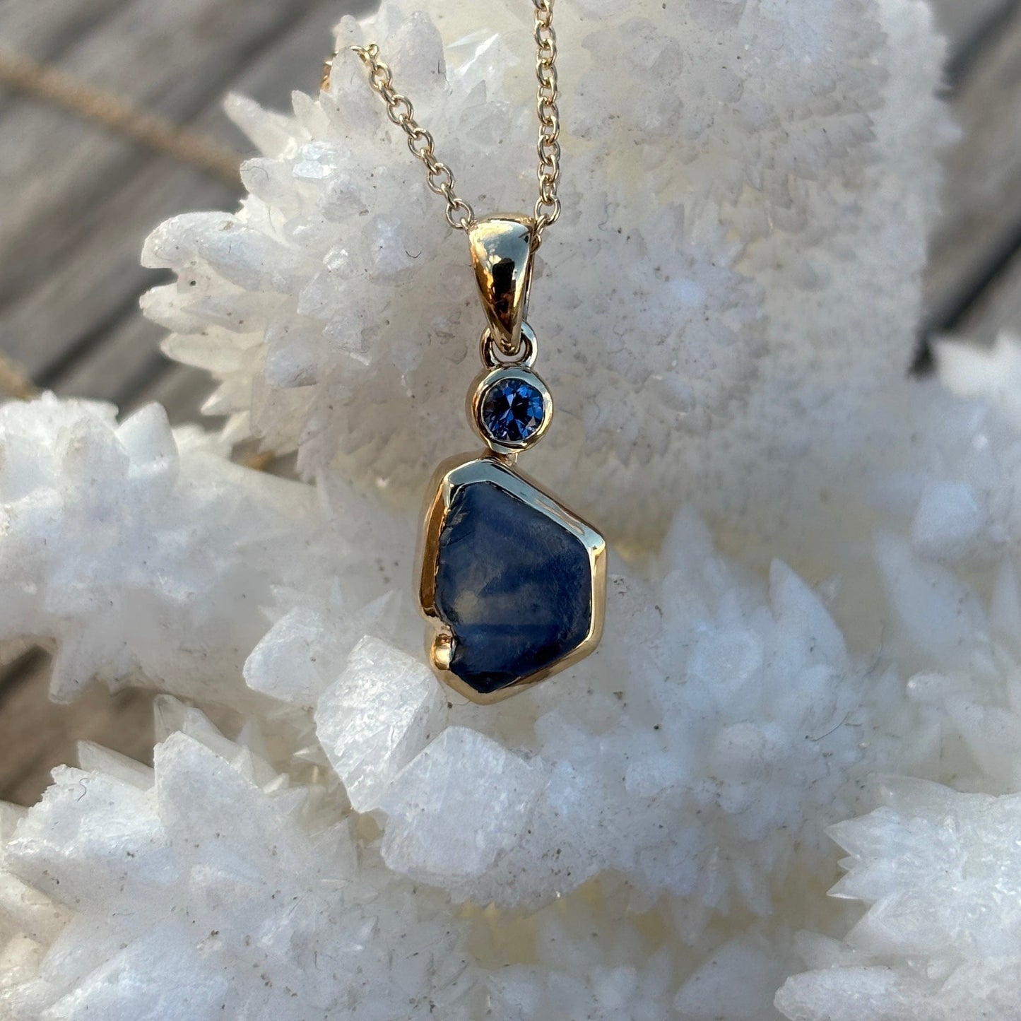 Uncut  Montana sapphire pendant with faceted sapphire accent 