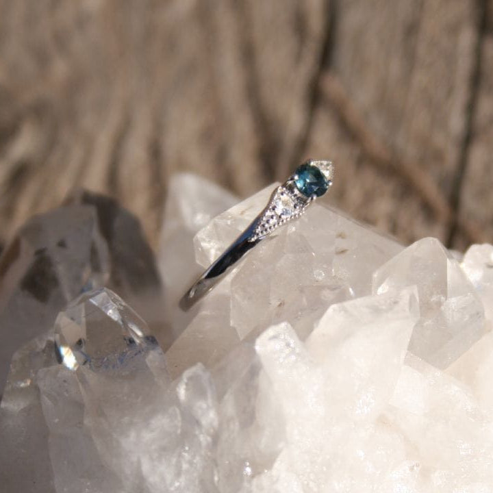 Blue and white sapphire three stone ring