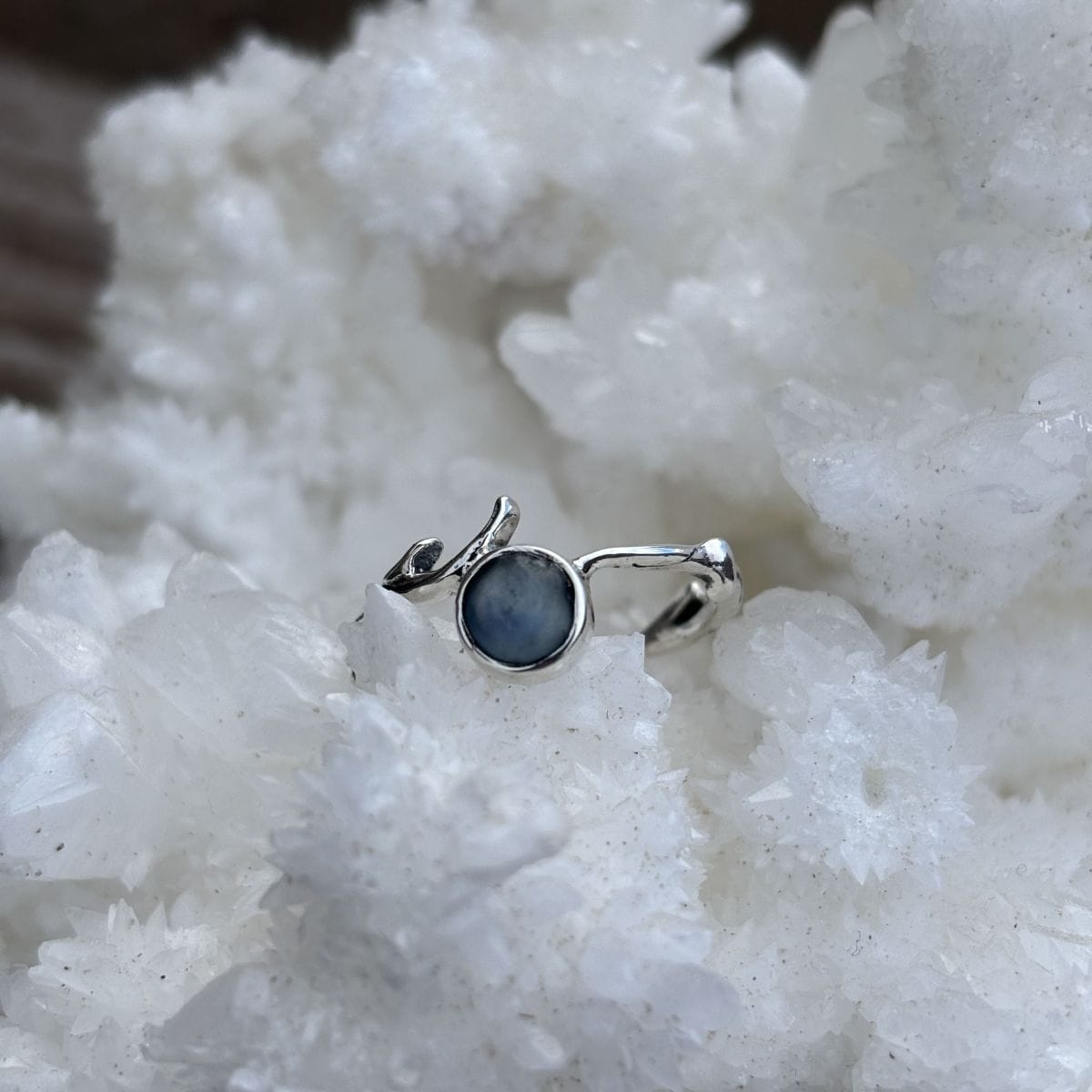 Bezel set branch textured Montana sapphire ring
