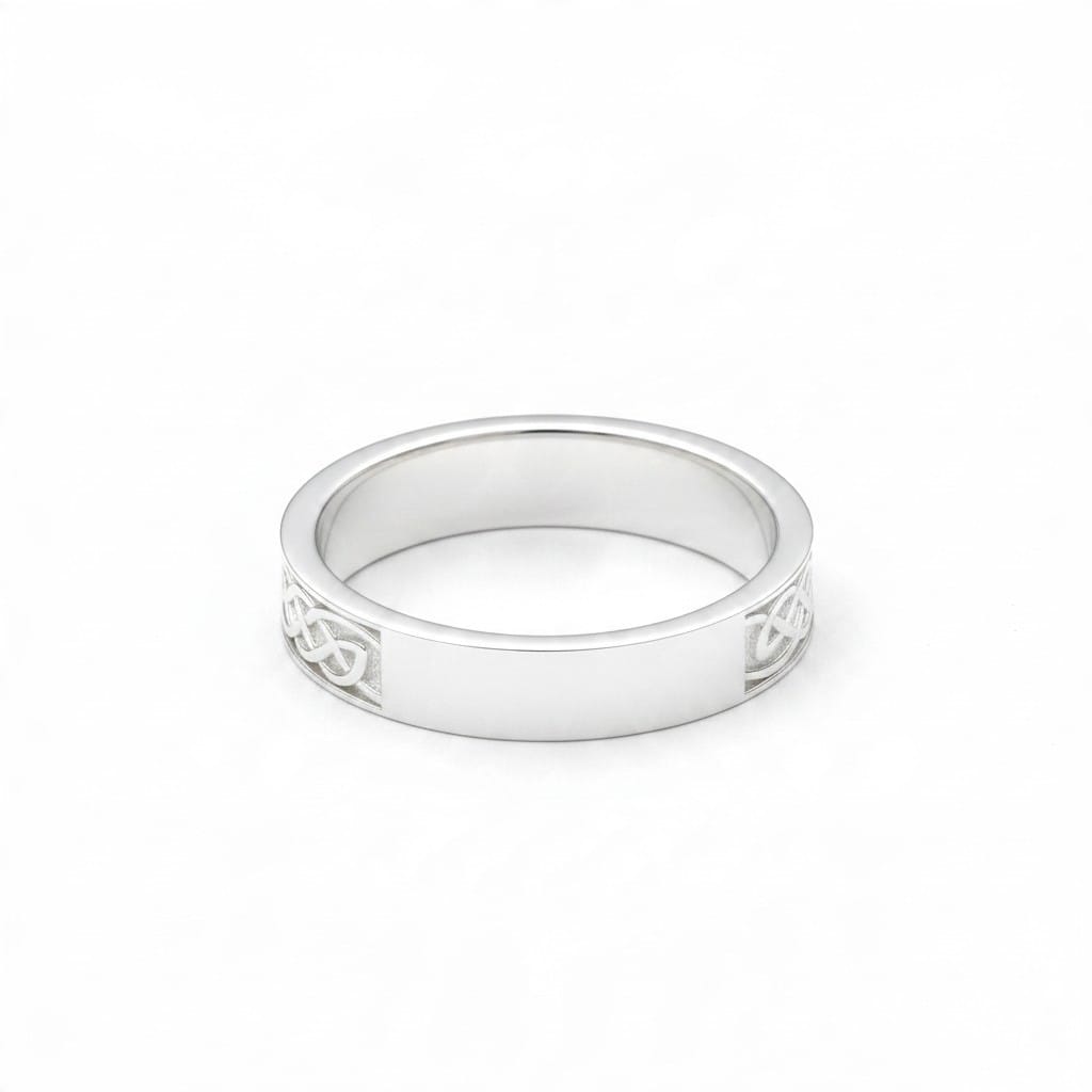 Montana Gems and Sapphire Jewelry sterling silver ring featuring an intricate Celtic knot design on a thick band.