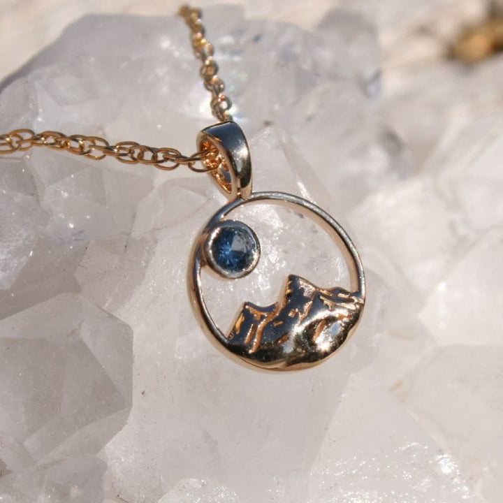 14k Gold mountain pendant necklace on crystal 
