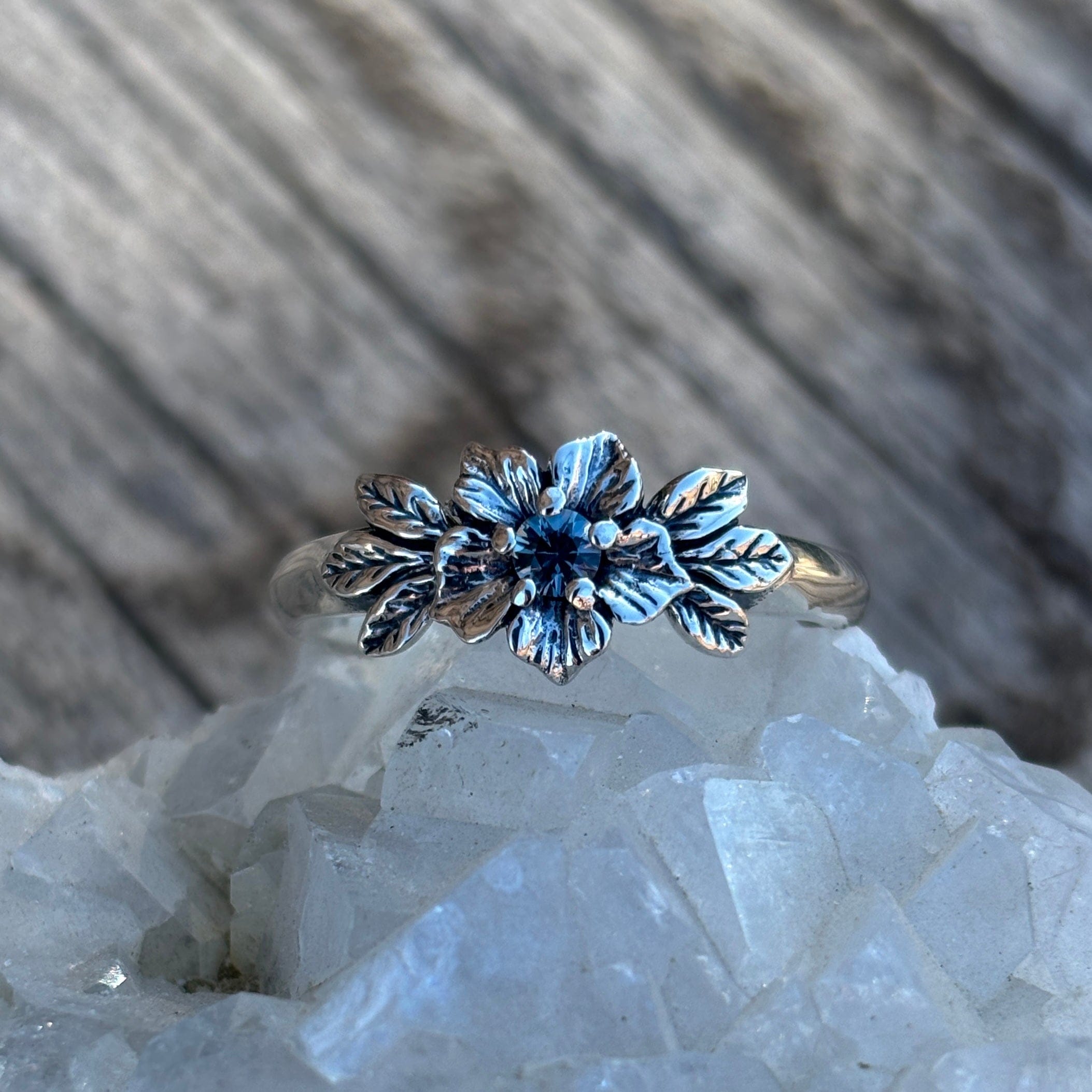 floral ring with small Rock Creek sapphire