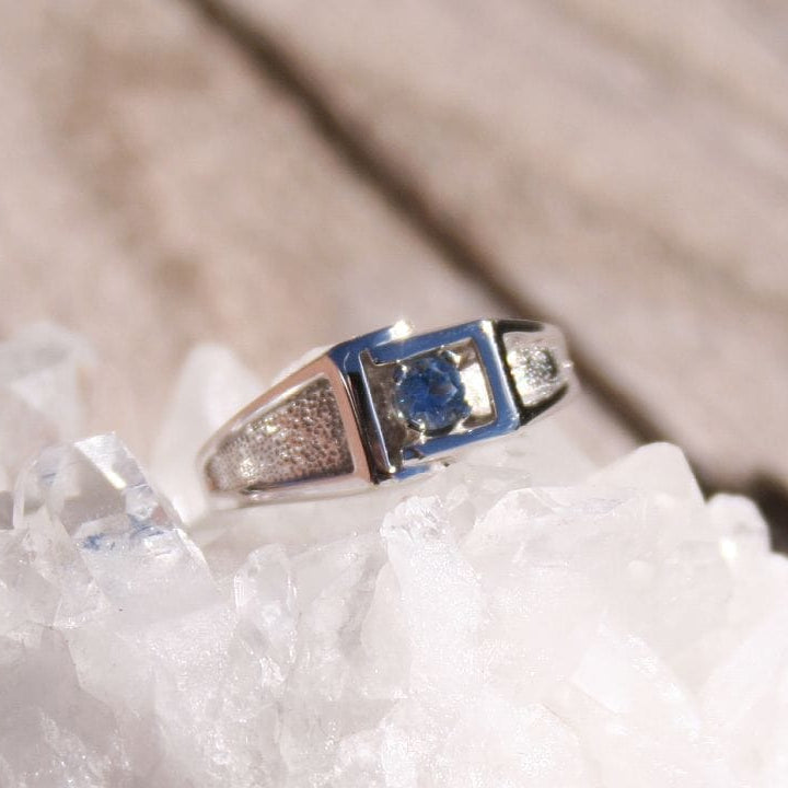 Men's sapphire ring on white crystal, 