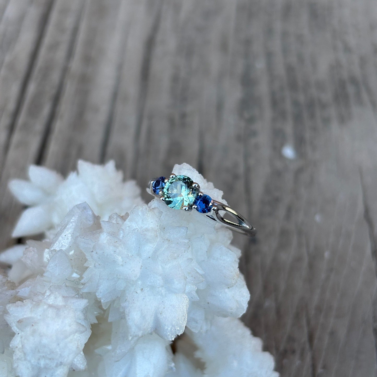 Natural green and yogo sapphires in engagement style ring