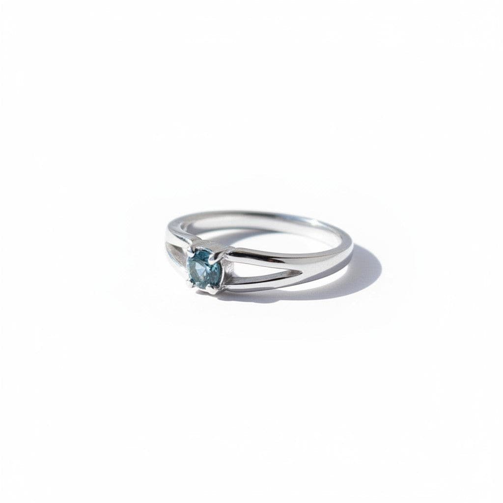 Montana Gems and Sapphire Jewelry split shank ring featuring a 3.5mm blue sapphire set in polished sterling silver.