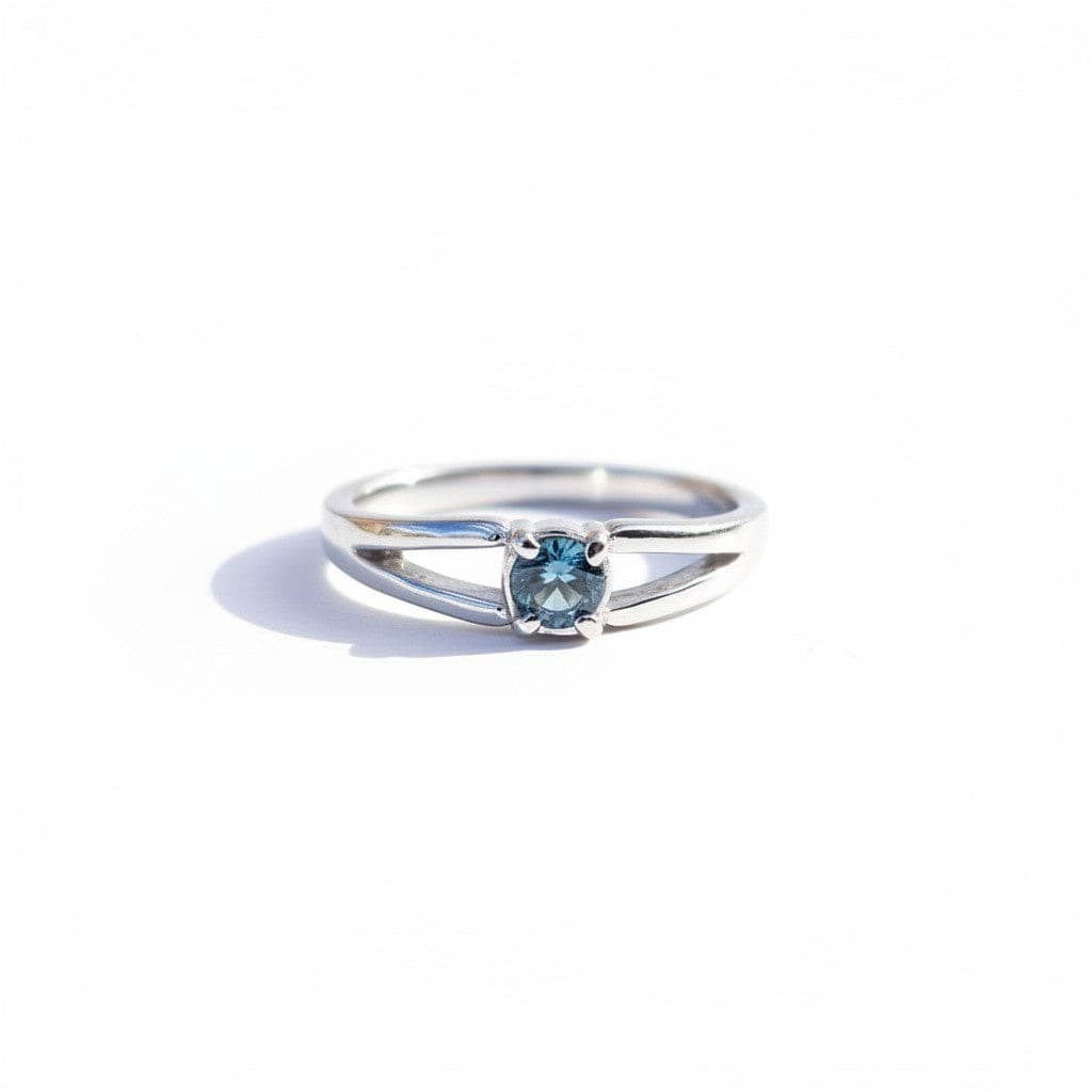 Montana Gems and Sapphire Jewelry sterling silver ring with a 3.5mm blue sapphire and a delicate split shank design.