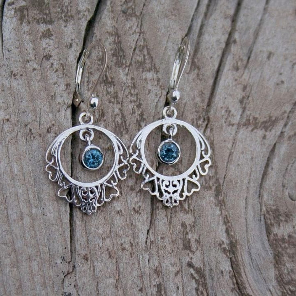 Heart dangle earrings with montana sapphires