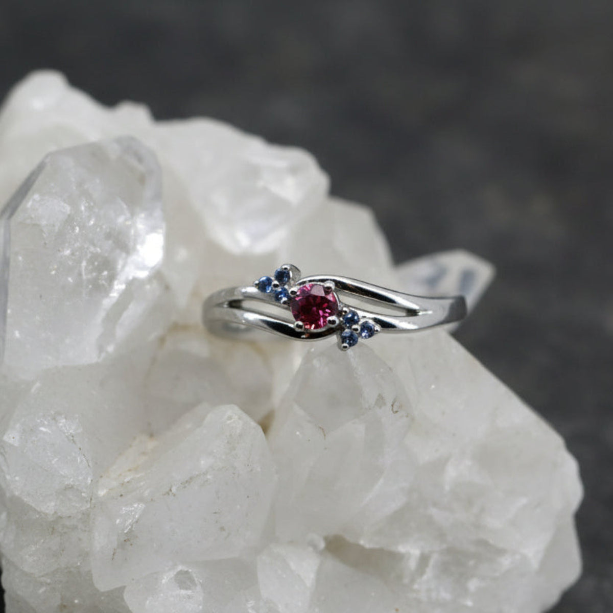 Pink and Yogo lavender sapphires split shank ring 