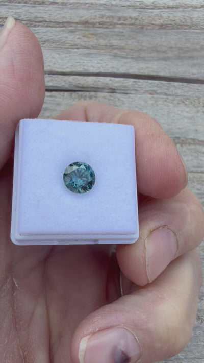 1.71ct video of round teal Montana sapphire