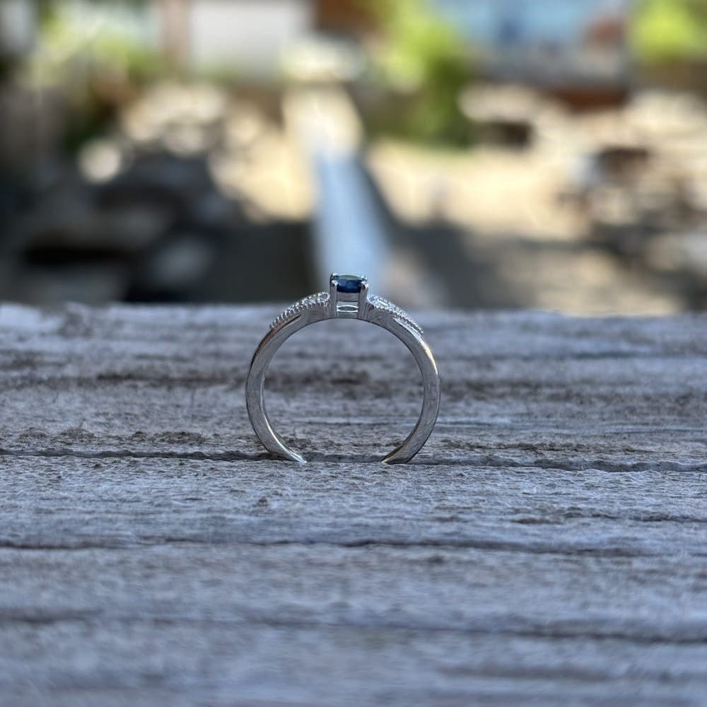 Side view of our 3 stone antique inspired ring.  Dainty sterling ring.