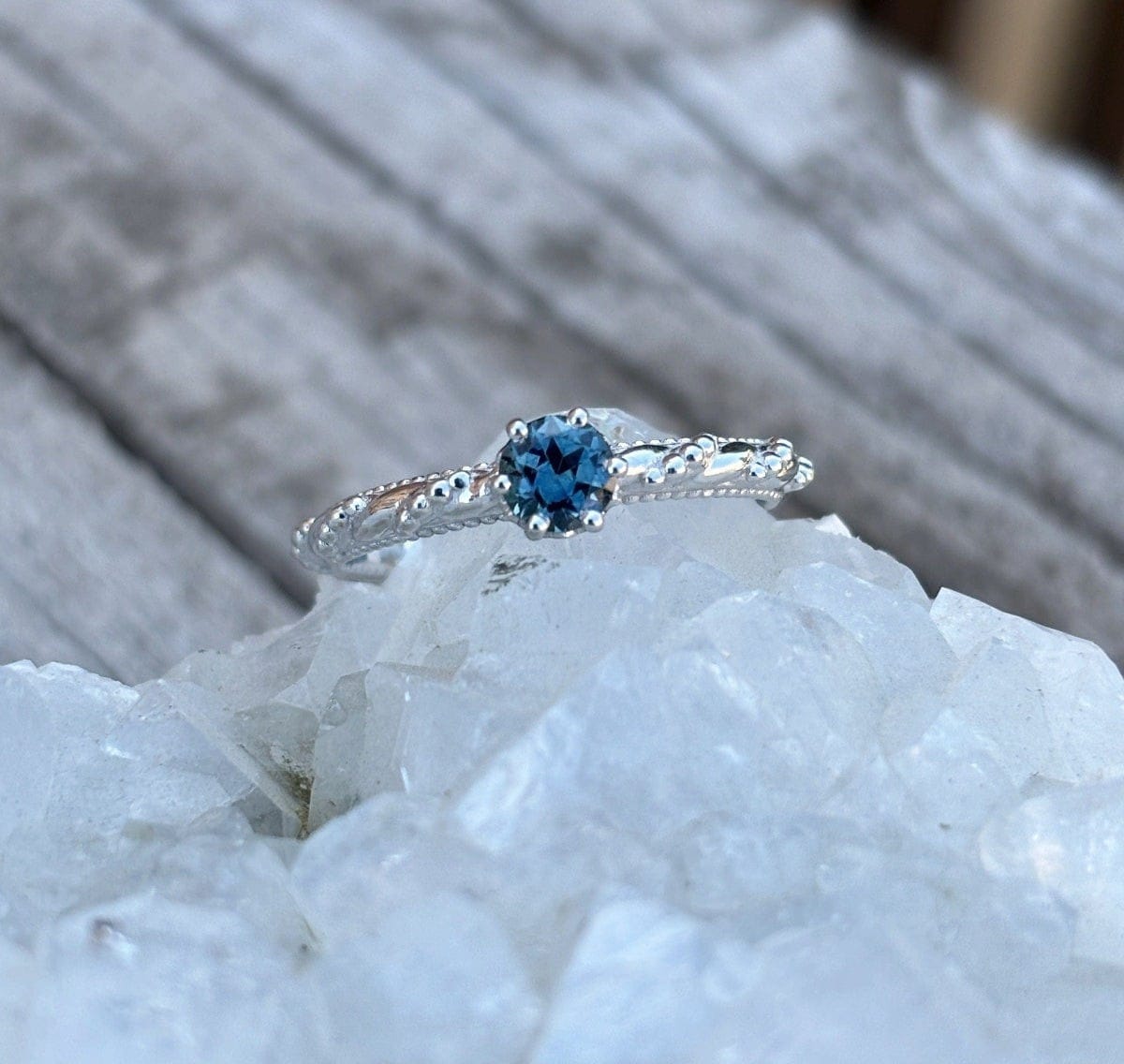 Twisted beaded band ring with blue sapphire and low profile