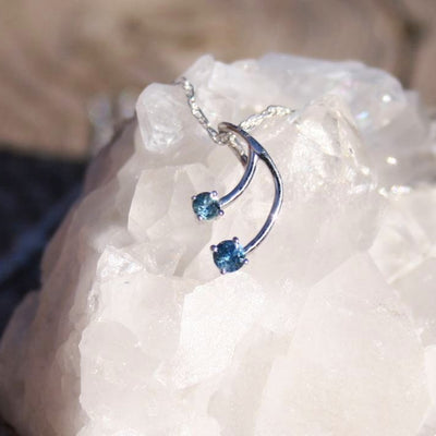 2 differnt sized montana sapphires in a dangle pendant