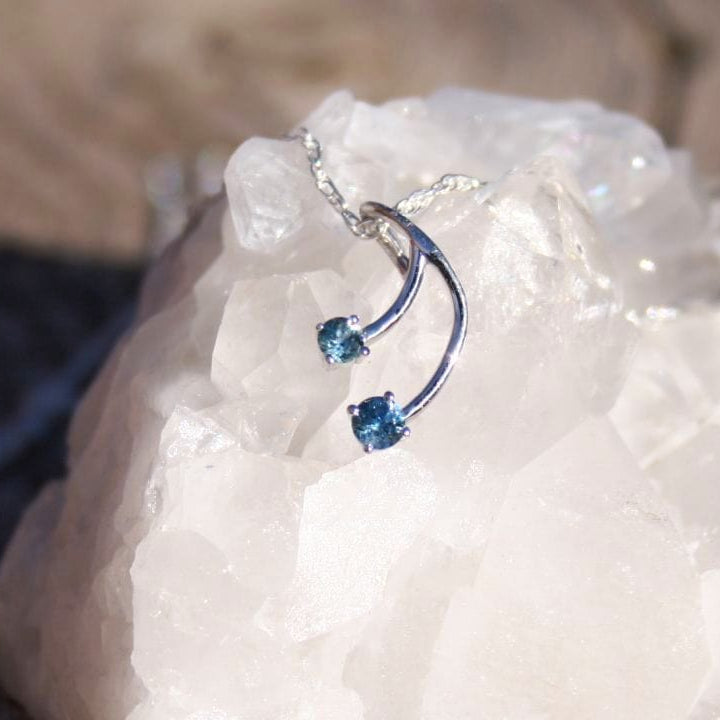 2 differnt sized montana sapphires in a dangle pendant