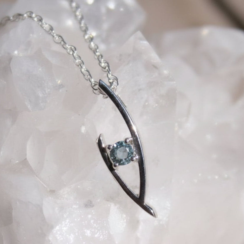 Silver pendant with blue Montana sapphire as the focal point