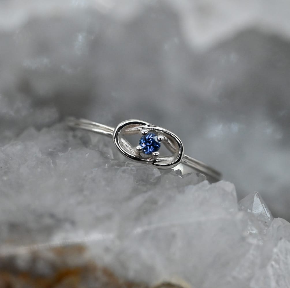 Montana Yogo sapphire in Celtic style band in 14k white gold