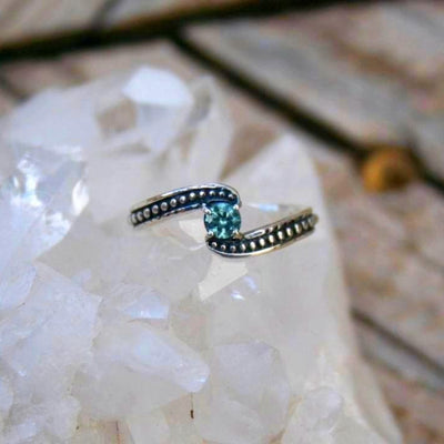 Oxidized beaded bypass textured Montana sapphire ring. 